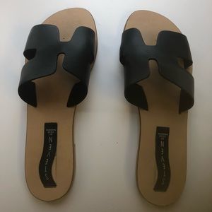 Steven by Steve Madden “Greece” sandals in black